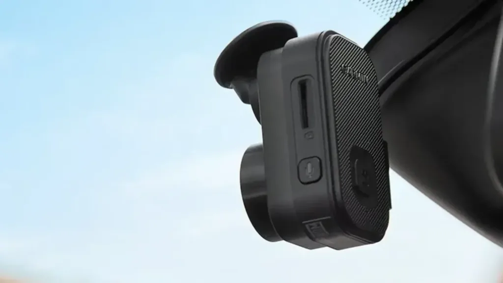 The Garmin dash cam Mini 2 mounted on a windscreen, one of the best dash cam models in Australia
