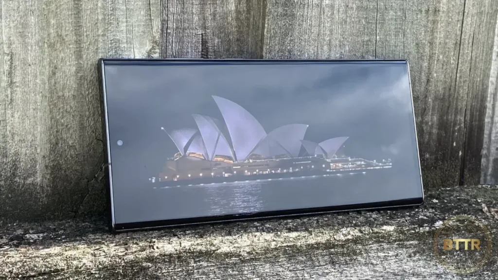 The Samsung Galaxy S23 on a fence viewing a photo of the Opera House